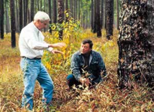 Neel and Jerry McCollum, president of Georgia Wildlife Federation,  in an old-growth forest. Photo by Richard T. Bryant. Email richard_t_bryant@mindspring.com