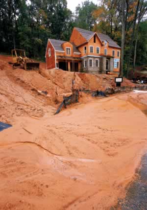 Sediment, combined with nonpoint-source pollutanta, is washing down from many Atlanta-area homesites and choking metro waterways. Photo by Richard T. Bryant. Email richard_t_bryant@mindspring.com.