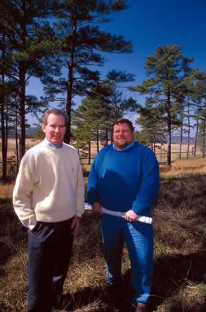 Al Nash, left, and Wal Rekuc say Eagle's emphasis on nature is even reflected in the building materials chosen for Rivermoore Park;s commor areas--granite, cedar, and limestone.Photo by Richard T. Bryant. Email richard_t_bryant@mindspring.com.