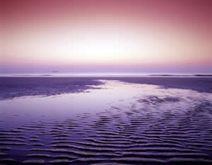 Georgia's wide beaches of firmly packed sand are perfect for walking and bike riding. Photo by Richard T. Bryant. Email richard_t_bryant@mindspring.com.