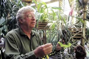 Schoettle at home in his greenhouse. Photo by Richard T. Bryant. Email richard_t_bryant@mindspring.com.