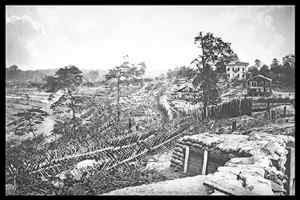 The view from Ft. Hood of the Ponder House ( sometimes erroneously referred to as the "Potter House,") and Confederate defense works which Sherman found too strong to assault, photographed by George N. Barnard, 1864.