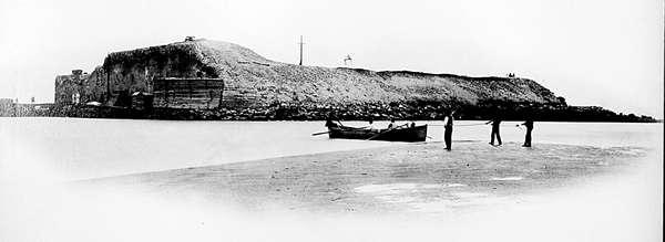 Fort Sumter viewed from a sand bar in Charleston Harbor, 1865, by George Barnard.