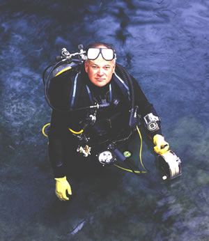 DeLoach emerges from a dive at Radium Springs in southwest Georgia. He is a leader on regional water issues based on his diving experience, work at Miller Brewing Company, and citizen volunteer efforts. Photo by Richard T. Bryant. Email richard_T_bryant@mindspring.com
