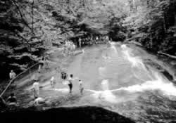 Many generations have enjoyed the innocent fun of shooting down Sliding Rock near Brevard.